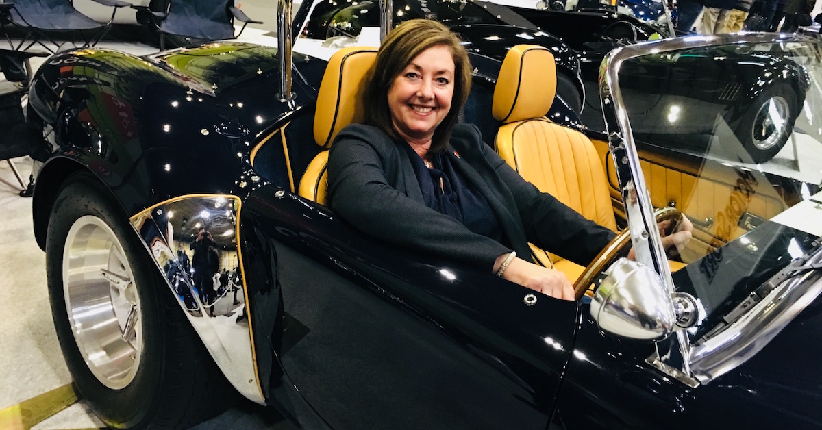 Jayne Jordan sitting in an AC Cobra